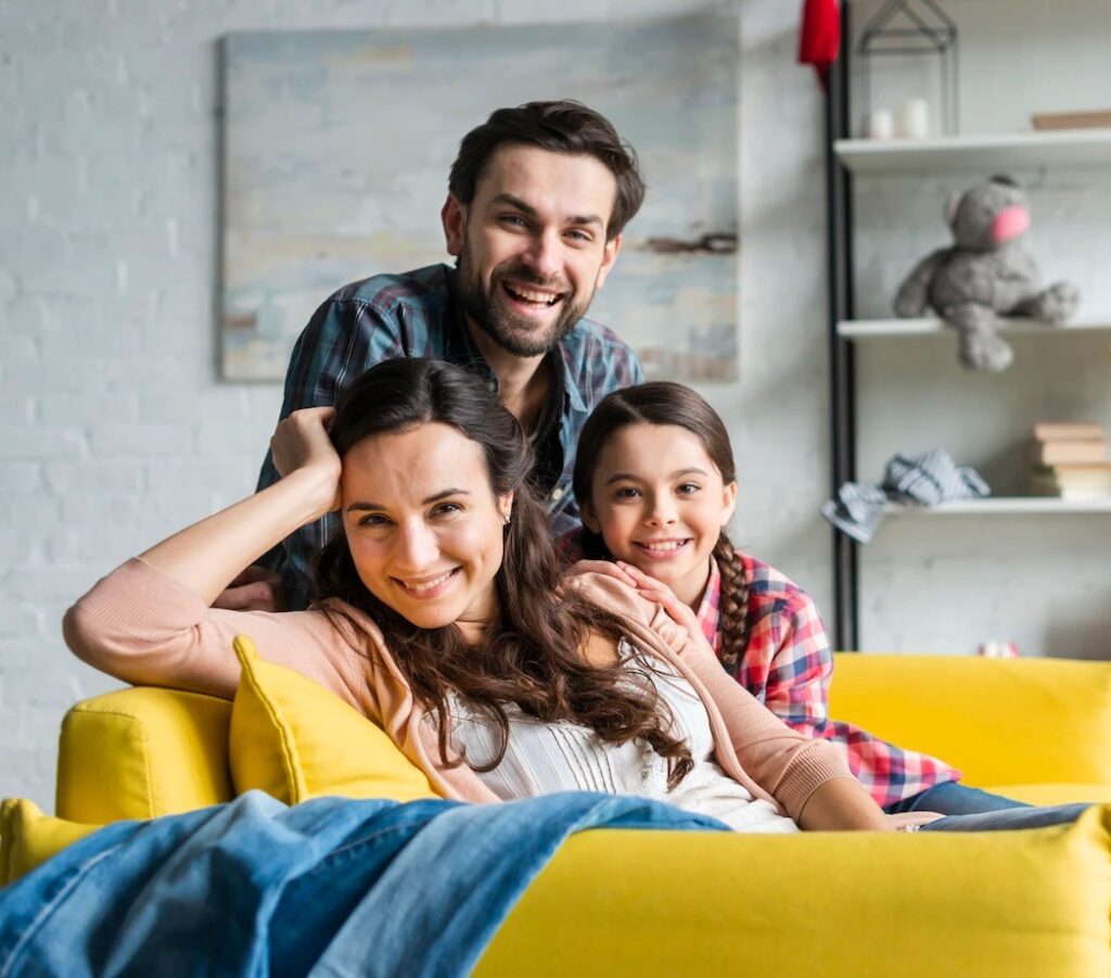 imgi 59 happy family sitting couch living room 23 2148456279
